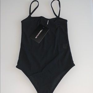 Black ribbed body suit